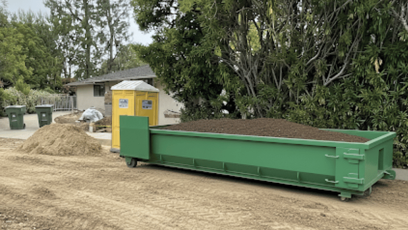 Lowboy Dumpster in Use
